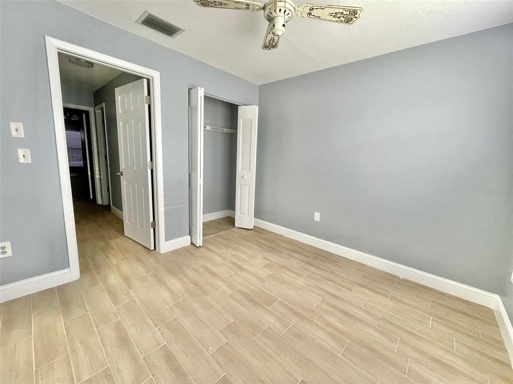2852 Stillwell Court New Port Richey, FL 34655 - Photo 8 of 13 wooden floor in a room