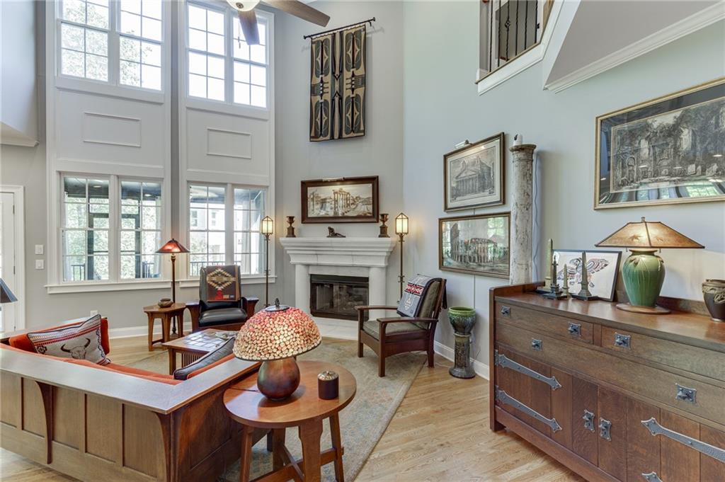 2758 Pathview Drive Dacula, GA 30019 - Photo 15 of 48 a living room with furniture and a fireplace