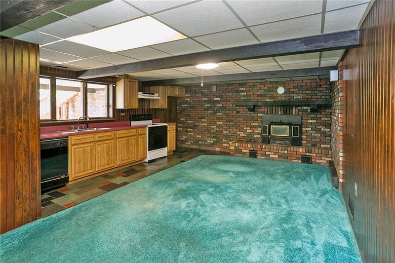 116 Rehoboth Church Road Perryopolis, PA 15473 - Photo 17 of 25 Family Room with wood burning stove plus for kitchen