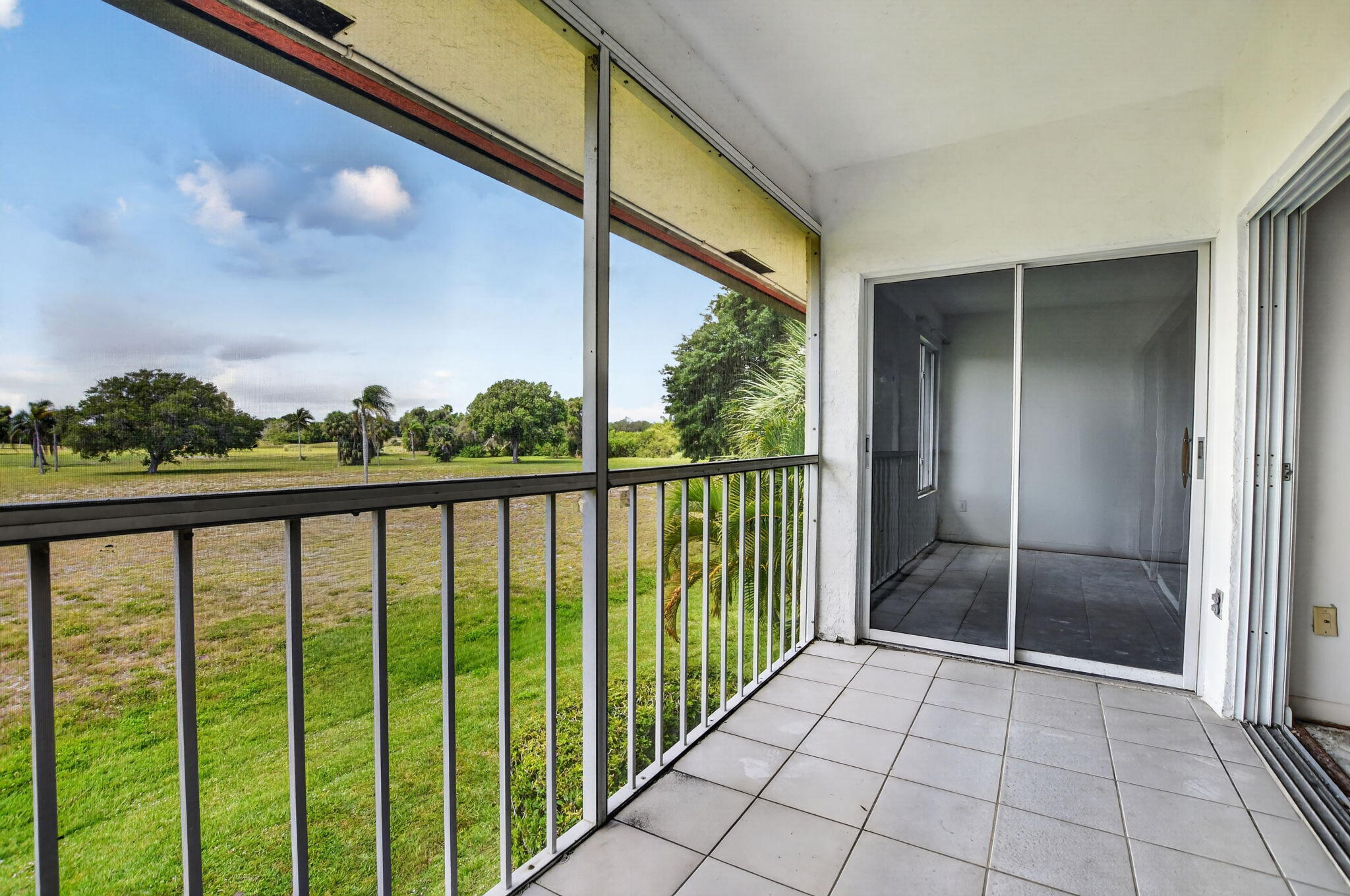 280 Northwest 67th Street, Unit B203 Boca Raton, FL 33487 - Photo 14 of 16 Rear Balcony