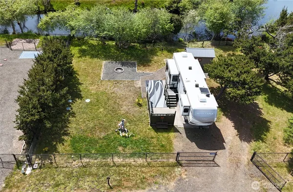 an aerial view of residential house with outdoor space