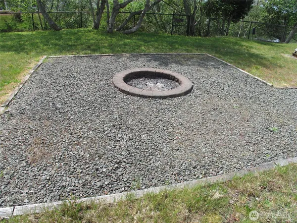 a view of a lake with a building in the background