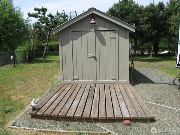 a view of outdoor space with deck and yard