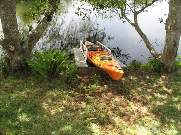 a view of lake with green space