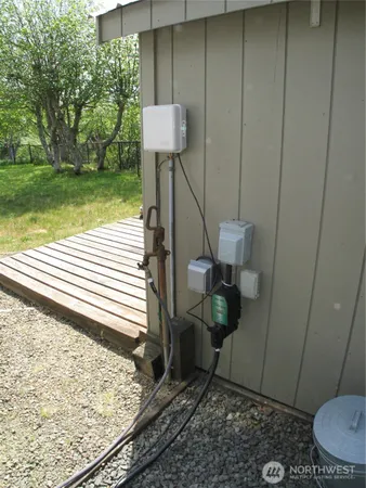 a view of a yard with trees