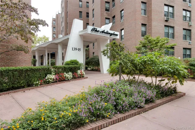 front view of a house with potted plants