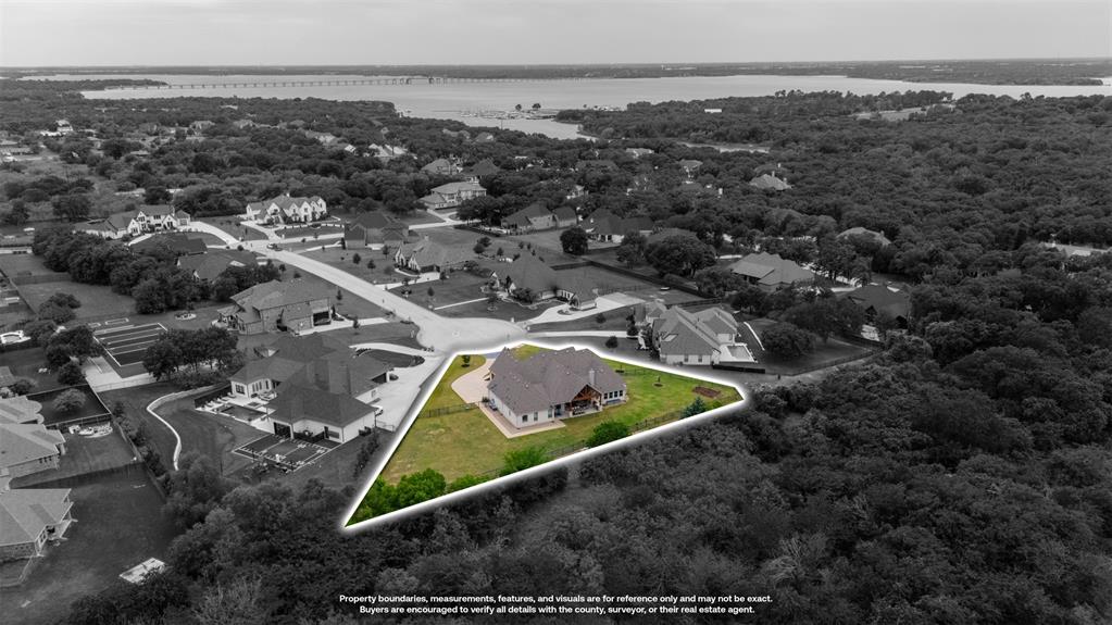 1060 Waters Edge Court Oak Point, TX 75068 - Photo 38 of 40 an aerial view of house with yard