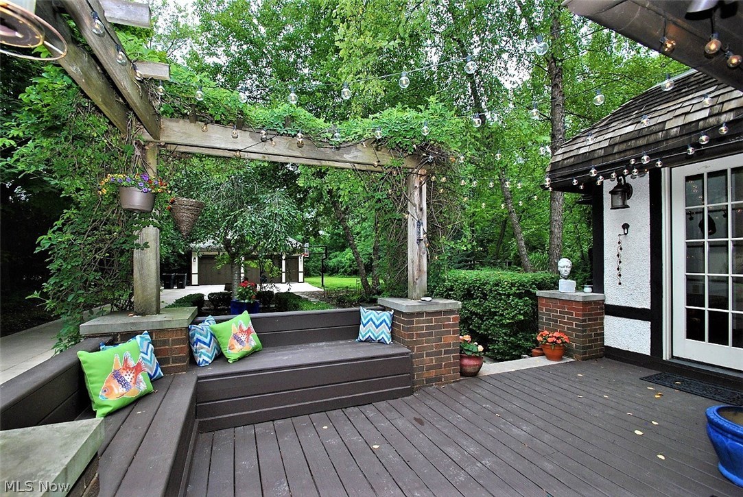 2570 Coventry Road Cleveland, OH 44120 - Photo 27 of 35 Deck with access from sun room and kitchen. Includes built in seating and steps down to yard and patio.