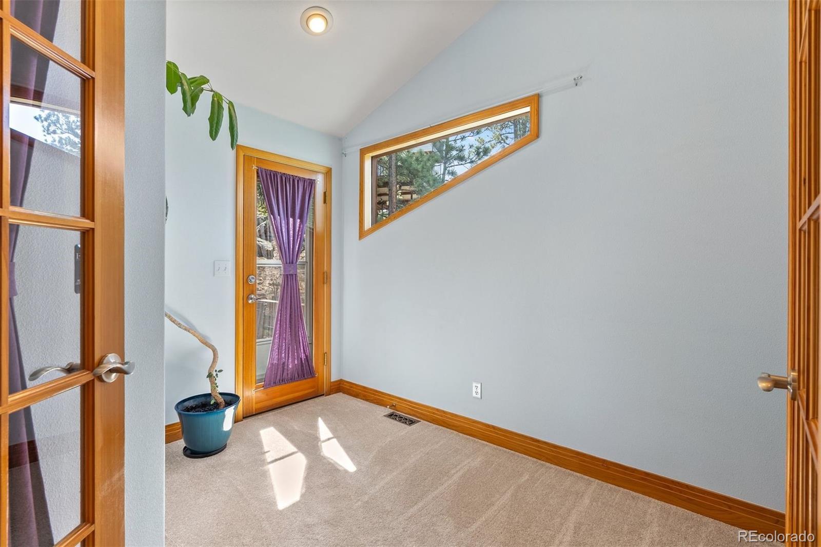 5811 Herzman Drive Evergreen, CO 80439 - Photo 24 of 49 a view of an entryway