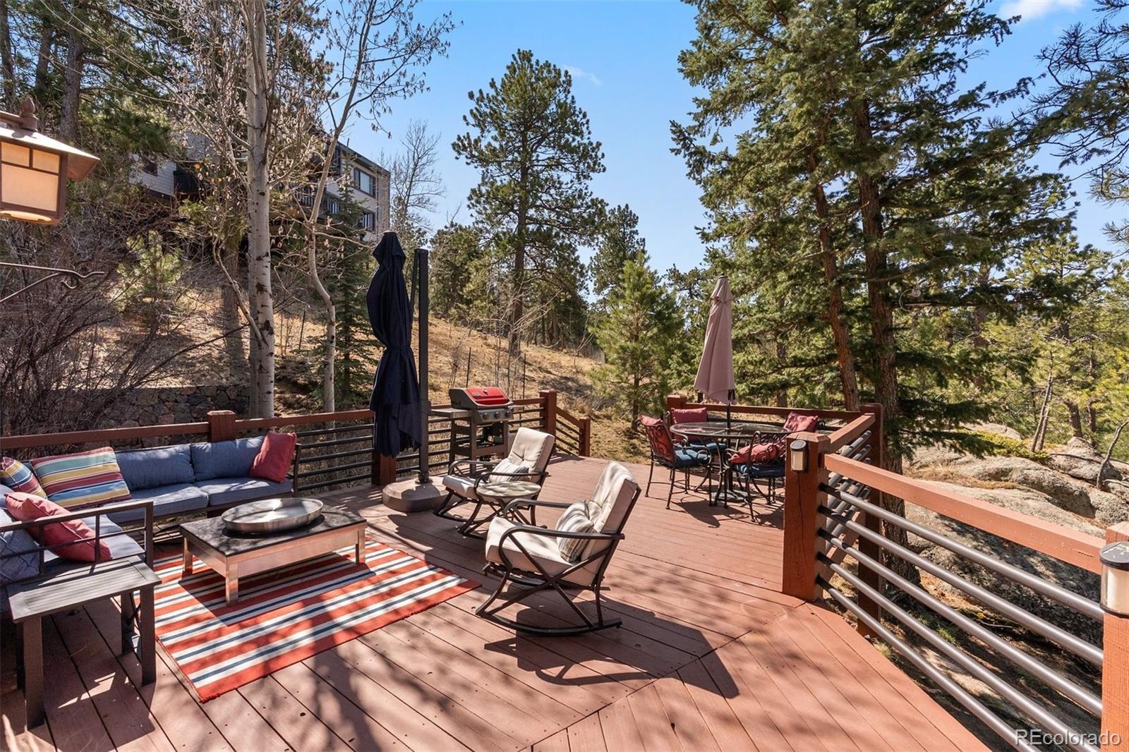 5811 Herzman Drive Evergreen, CO 80439 - Photo 38 of 49 a view of outdoor space with seating area