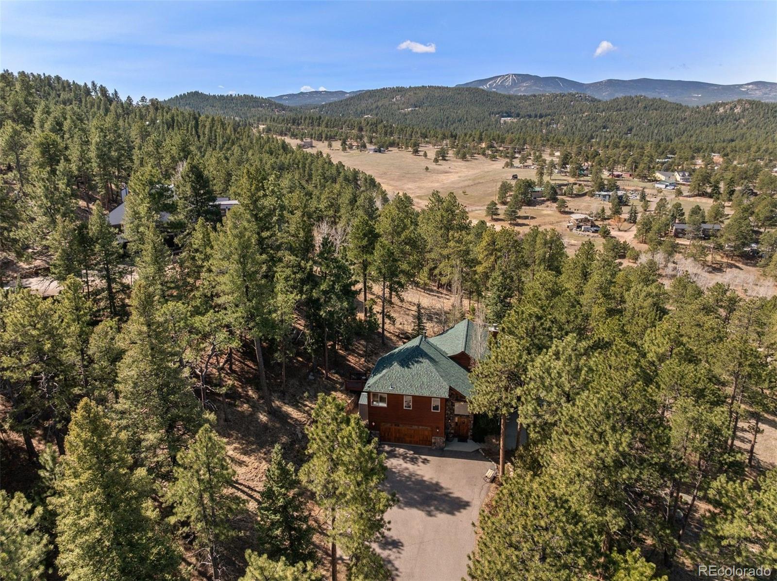 5811 Herzman Drive Evergreen, CO 80439 - Photo 47 of 49 a view of lake and mountain
