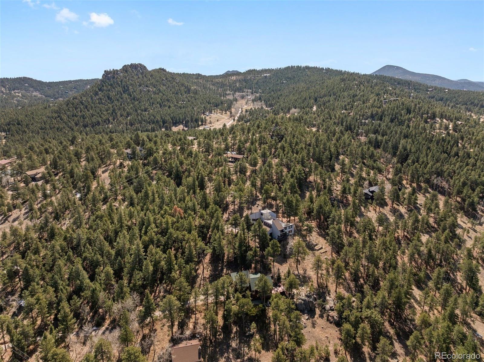 5811 Herzman Drive Evergreen, CO 80439 - Photo 48 of 49 a view of a city with mountain