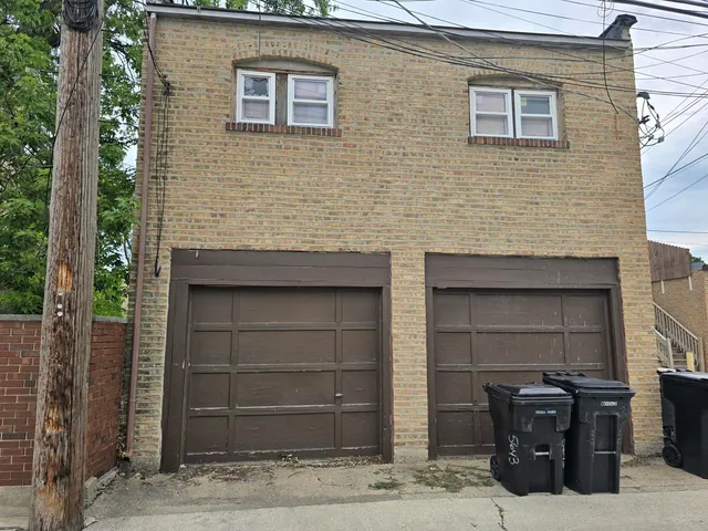 a front view of a house with parking