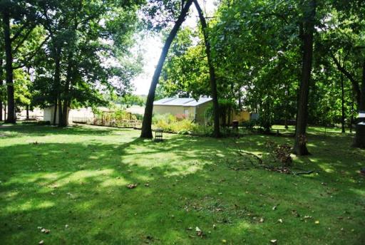 8787 Huber Road Belvidere, IL 61008 - Photo 4 of 16 a view of a backyard with large trees