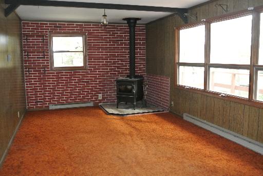 8787 Huber Road Belvidere, IL 61008 - Photo 7 of 16 a view of an empty room with a window