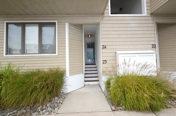 a view of a entryway door front of house