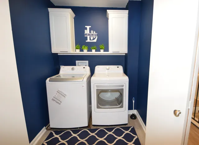 a view of a two chairs in the balcony