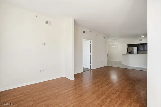 a view of a livingroom with wooden floor