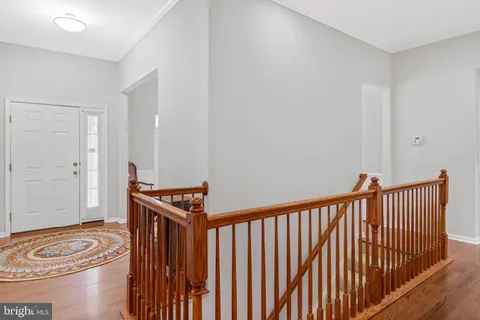 a view of room with wooden floor