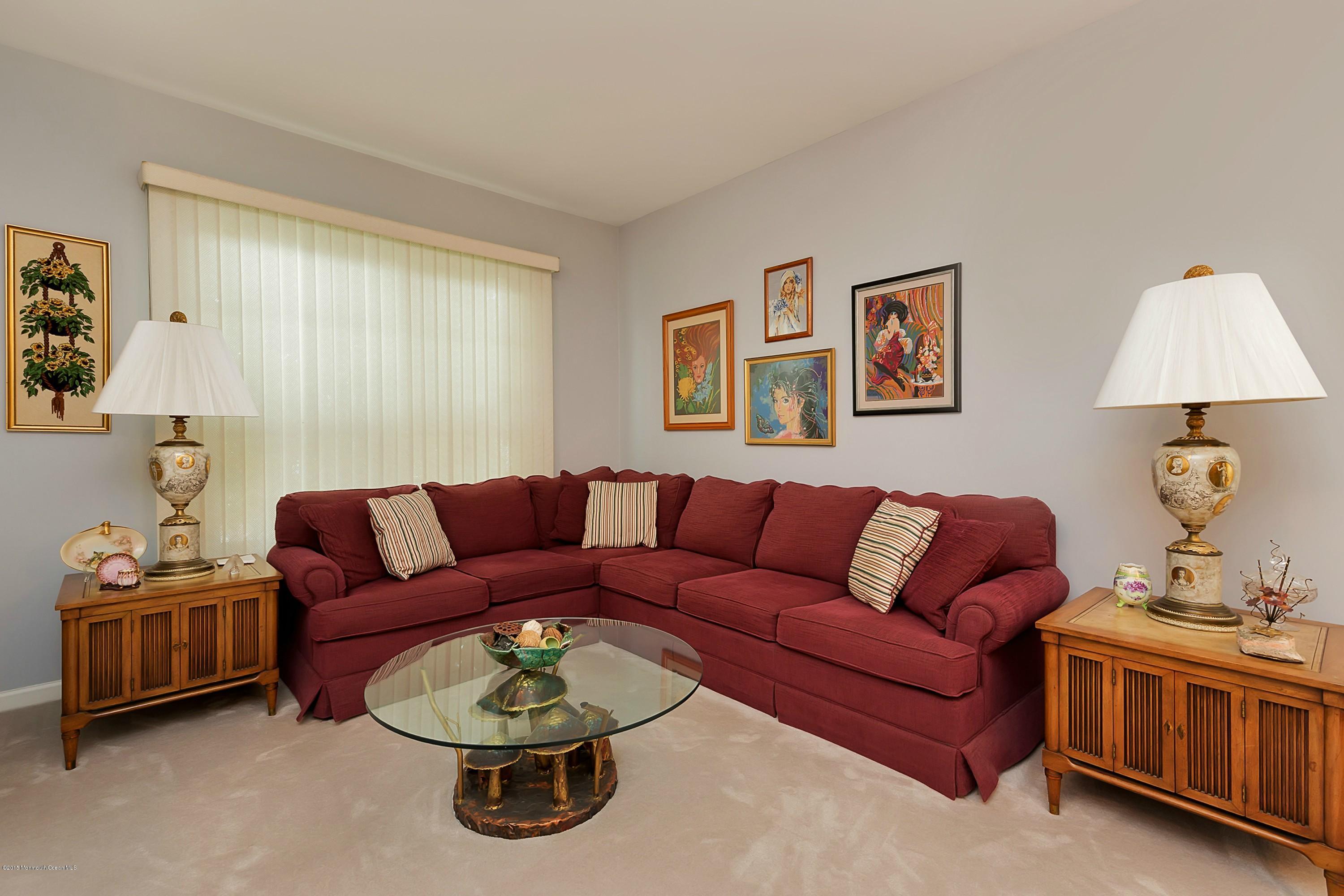 14 Shelley Road Brick, NJ 08724 - Photo 3 of 11 a living room with furniture a couch and a window