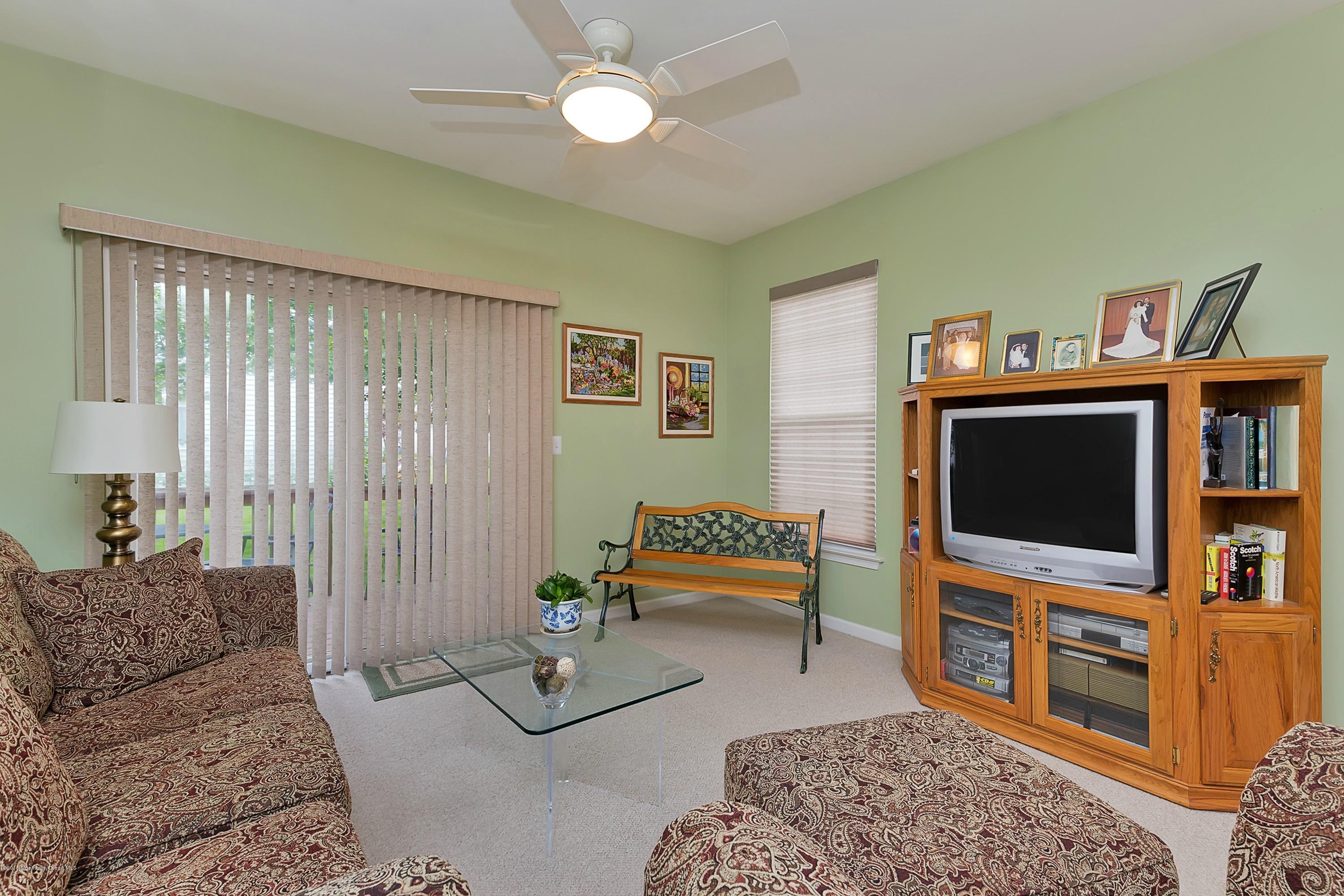 14 Shelley Road Brick, NJ 08724 - Photo 6 of 11 a living room with furniture and a flat screen tv