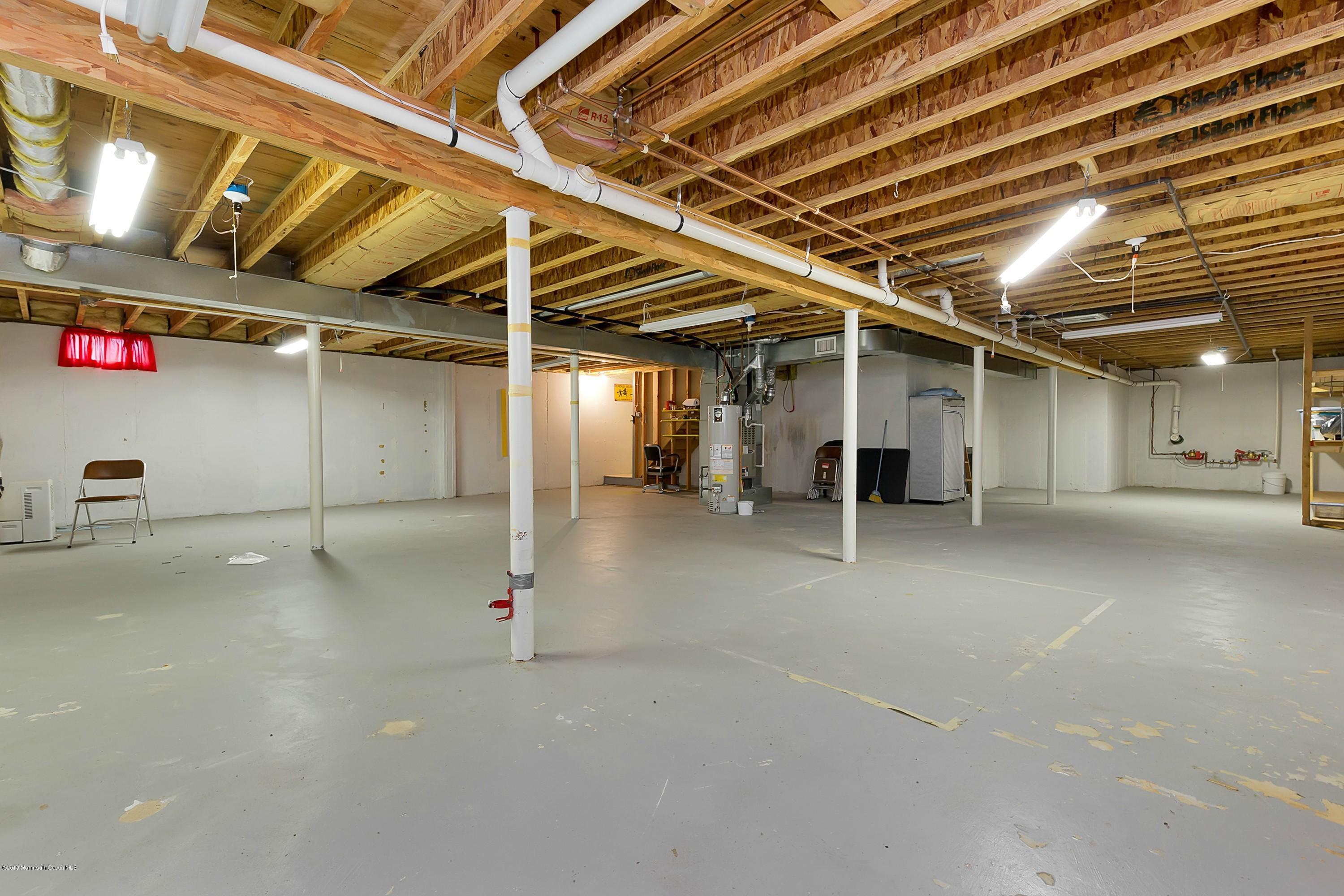 14 Shelley Road Brick, NJ 08724 - Photo 10 of 11 a view of empty room with wooden ceiling