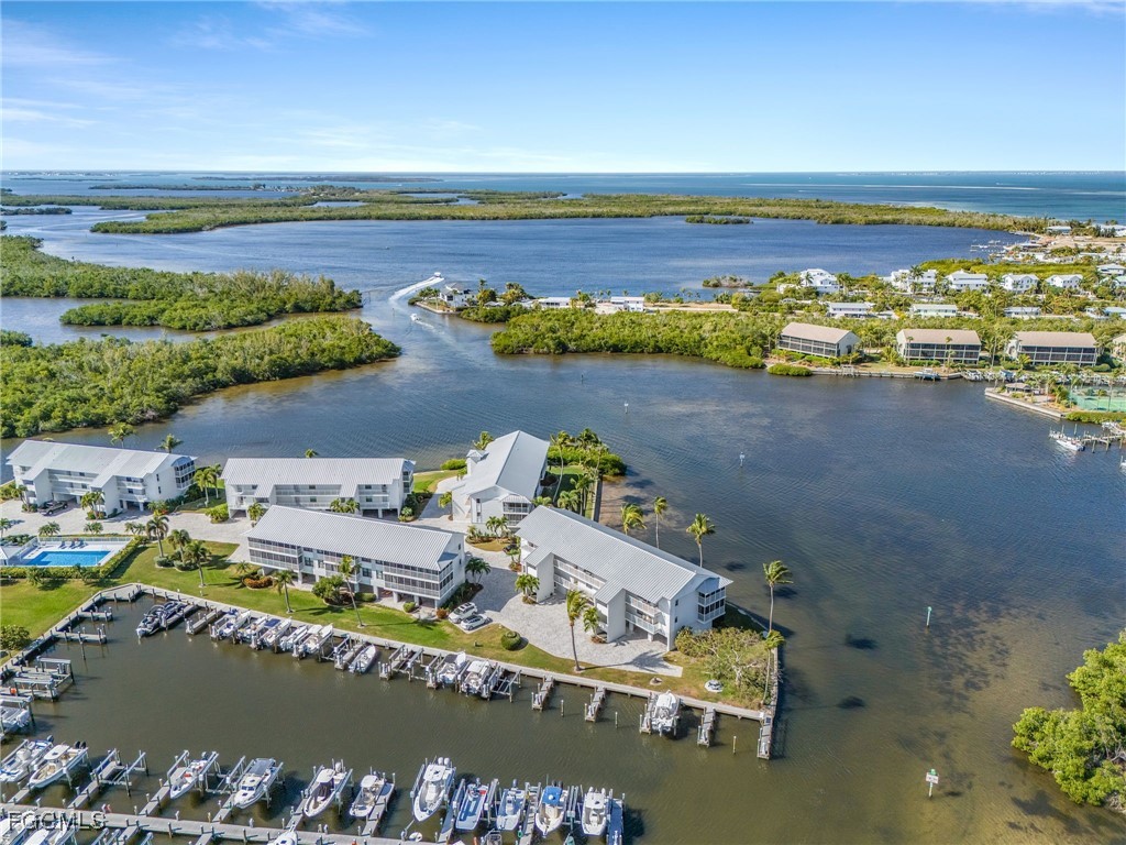 16641 Stringfellow Road, Unit 506 Bokeelia, FL 33922 - Photo 31 of 43 a view of a city with an ocean