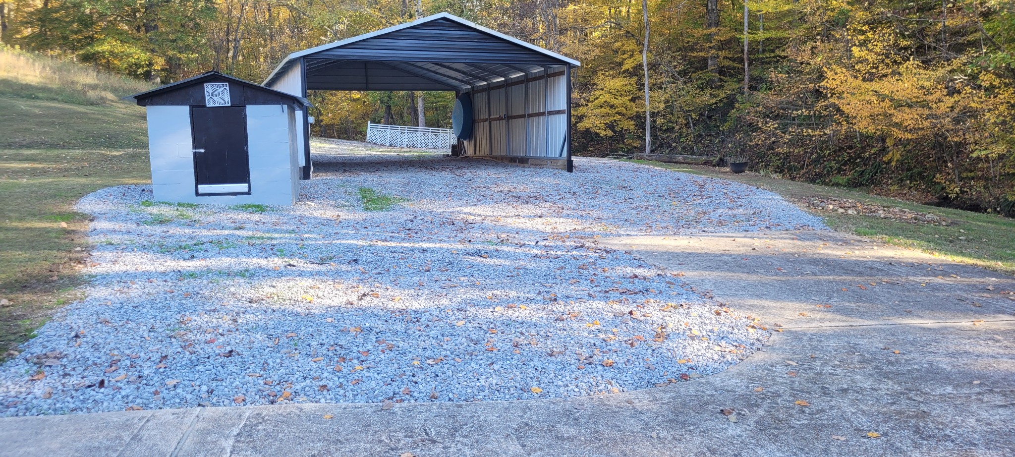495 Shepherd Hollow Road Indian Mound, TN 37079 - Photo 12 of 30 a front view of a house with a yard and garage