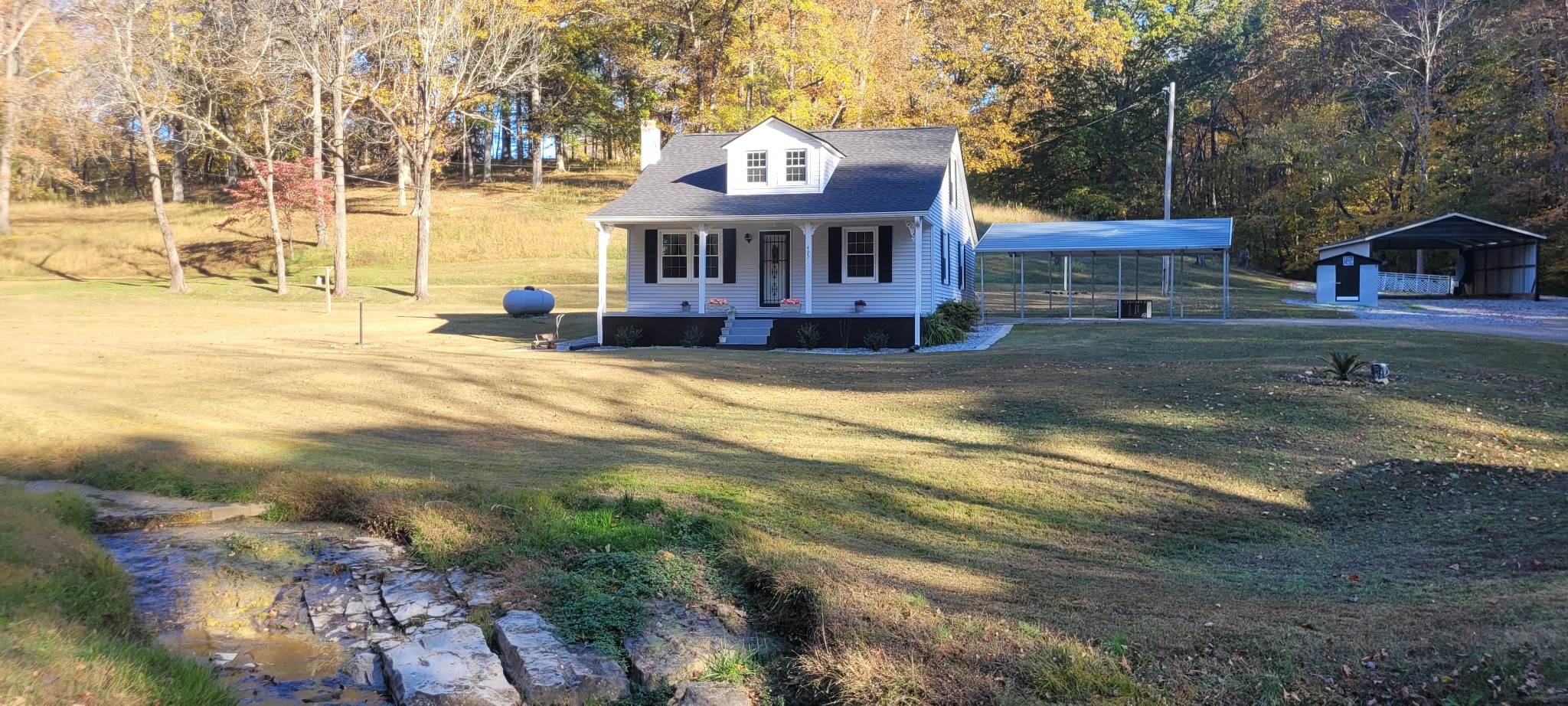 495 Shepherd Hollow Road Indian Mound, TN 37079 - Photo 2 of 30 a view of a house with a yard