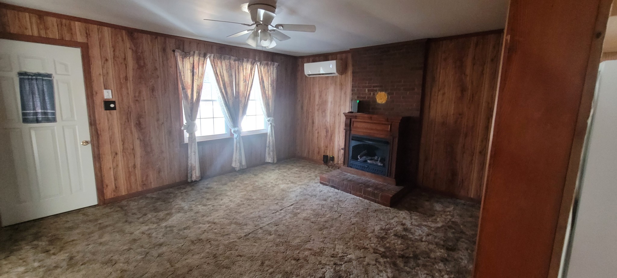 495 Shepherd Hollow Road Indian Mound, TN 37079 - Photo 23 of 30 wooden floor in an empty room with a window