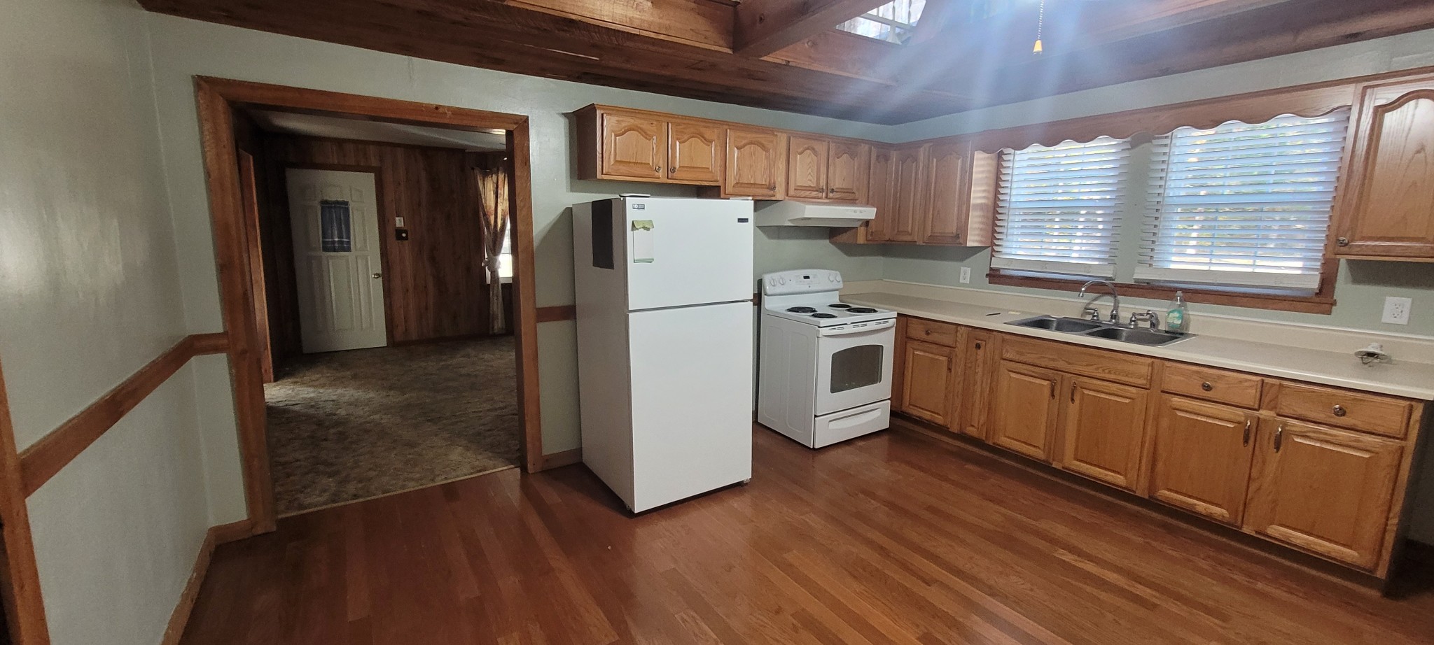 495 Shepherd Hollow Road Indian Mound, TN 37079 - Photo 24 of 30 a kitchen with a refrigerator sink and cabinets