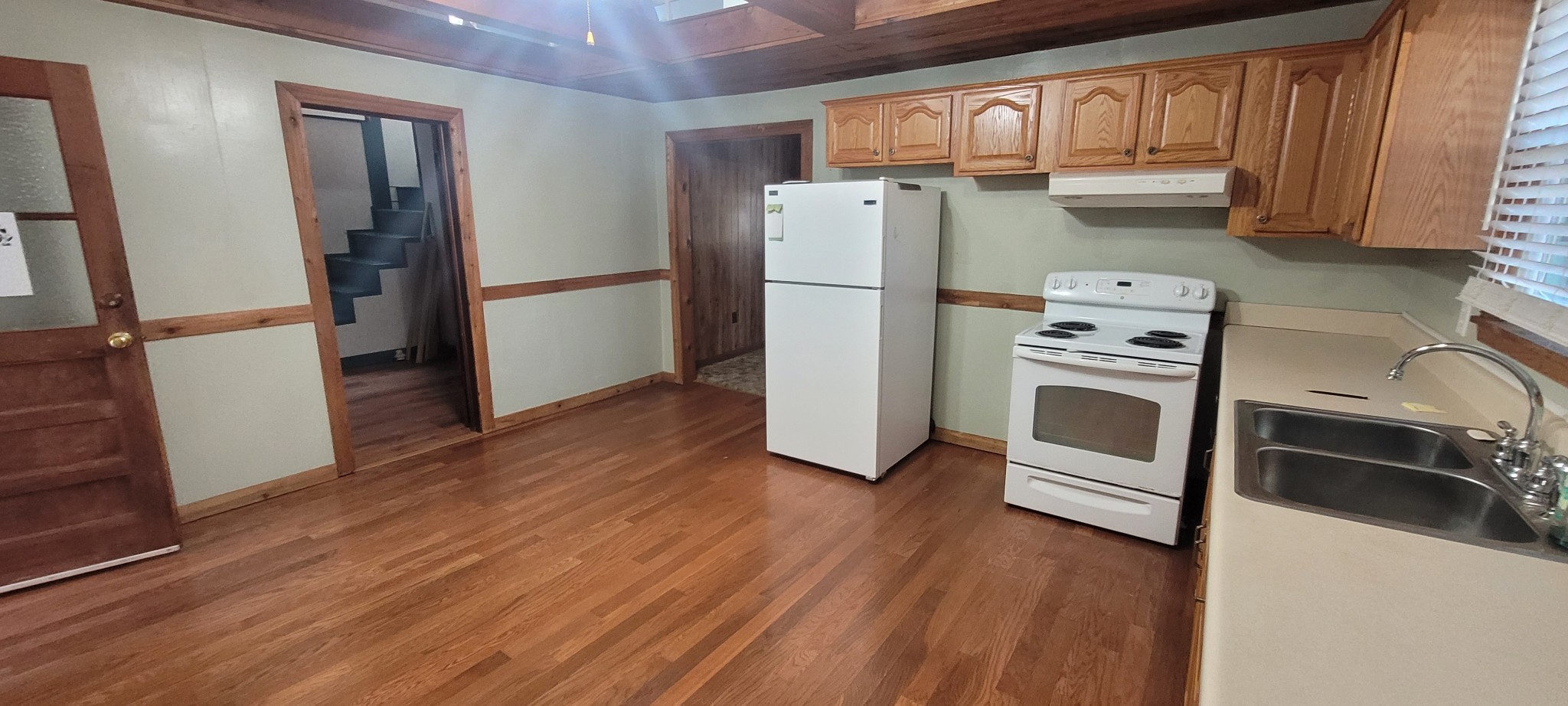 495 Shepherd Hollow Road Indian Mound, TN 37079 - Photo 26 of 30 a kitchen with stainless steel appliances a refrigerator and a stove top oven