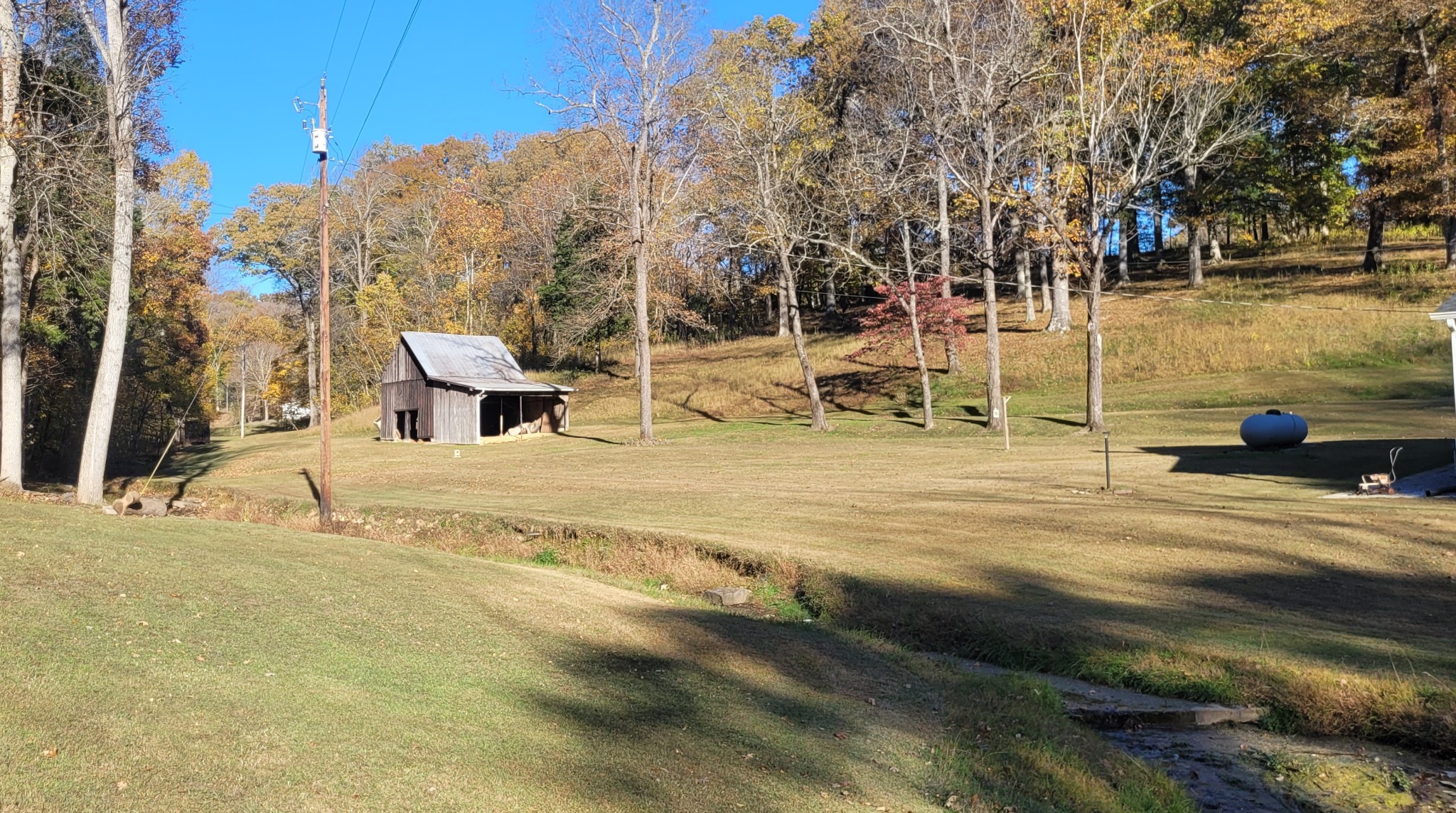 495 Shepherd Hollow Road Indian Mound, TN 37079 - Photo 3 of 30 a view of a swimming pool with a patio