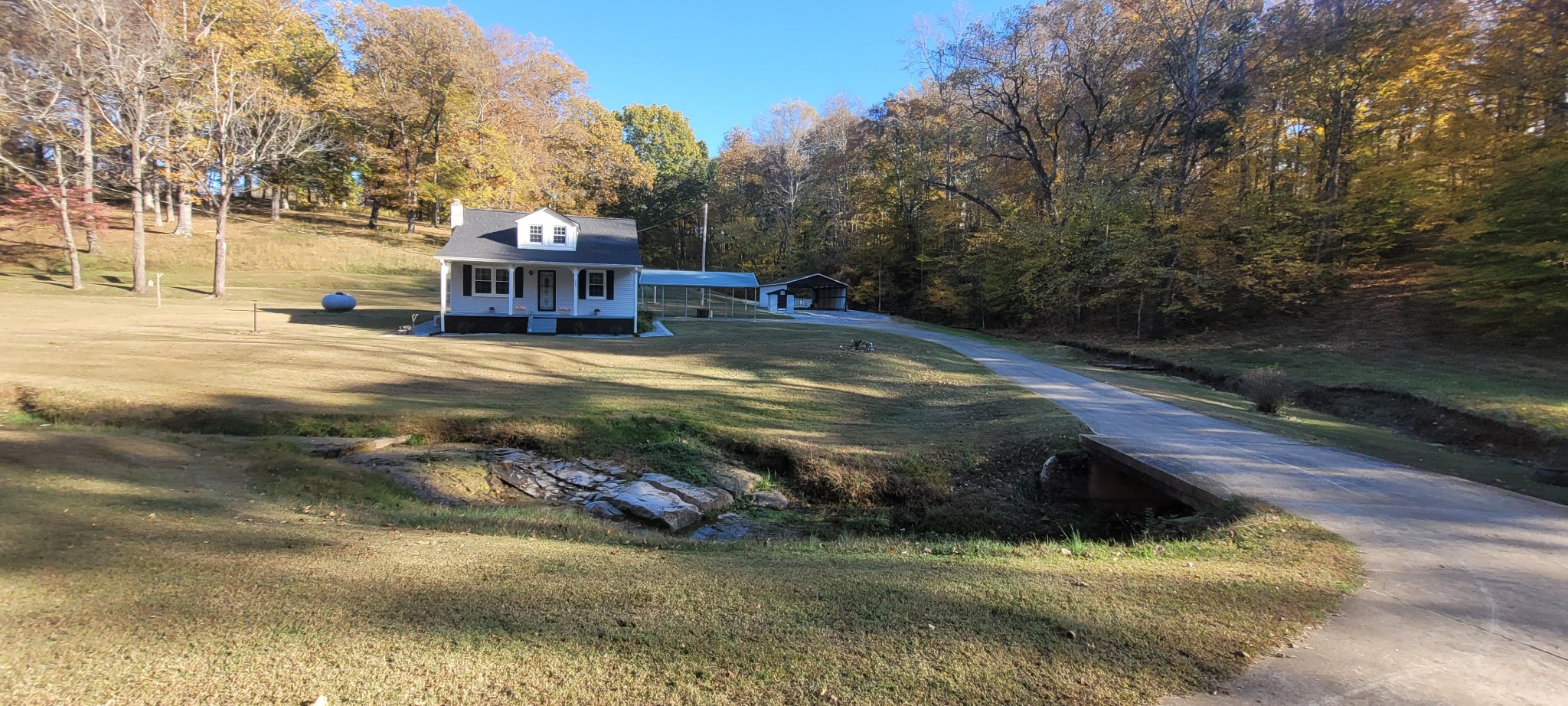 495 Shepherd Hollow Road Indian Mound, TN 37079 - Photo 4 of 30 a view of a town with large trees