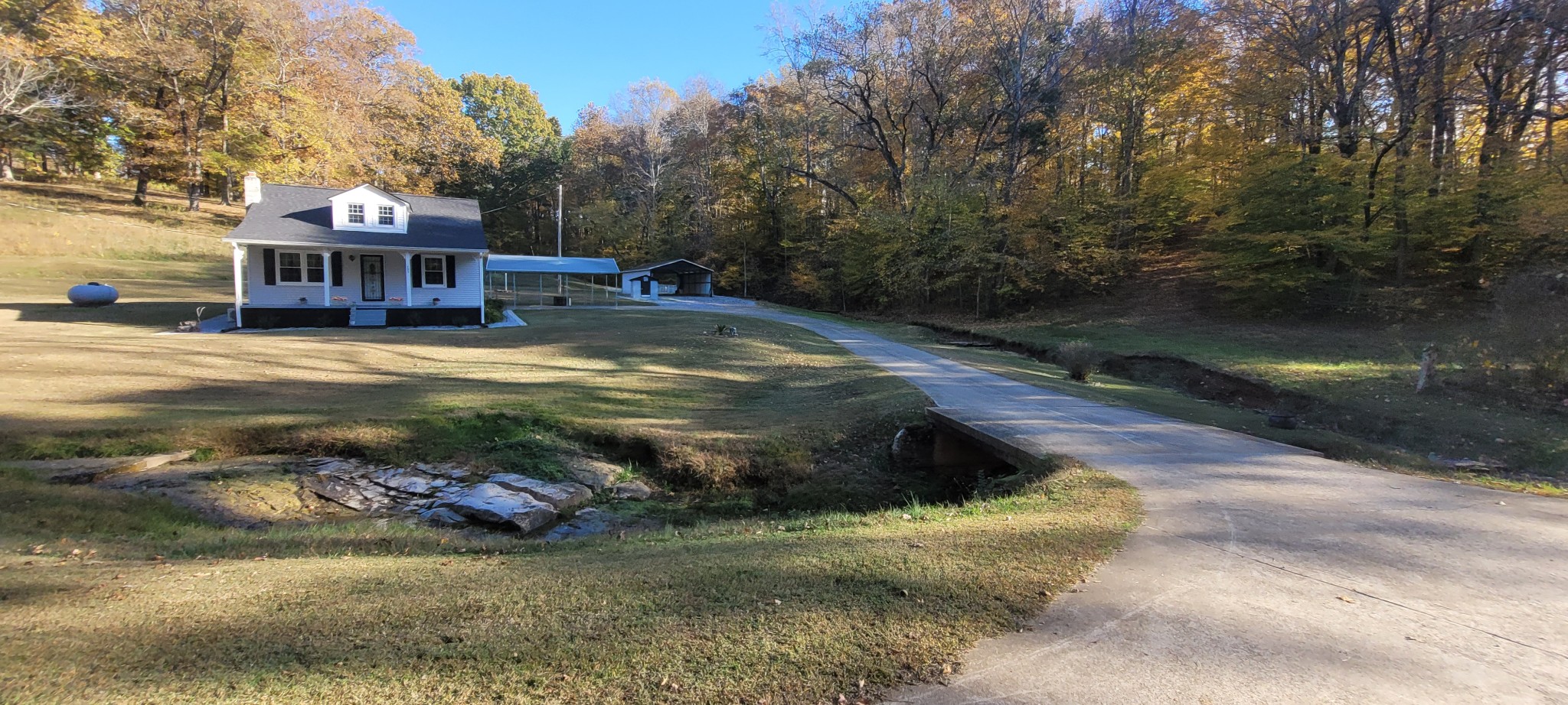 495 Shepherd Hollow Road Indian Mound, TN 37079 - Photo 9 of 30 a view of a swimming pool with a patio