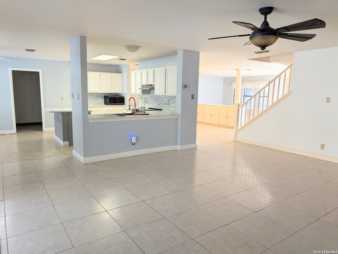 16414 Bulverde Point San Antonio, TX 78247 - Photo 12 of 46 a large kitchen with cabinets and a stove
