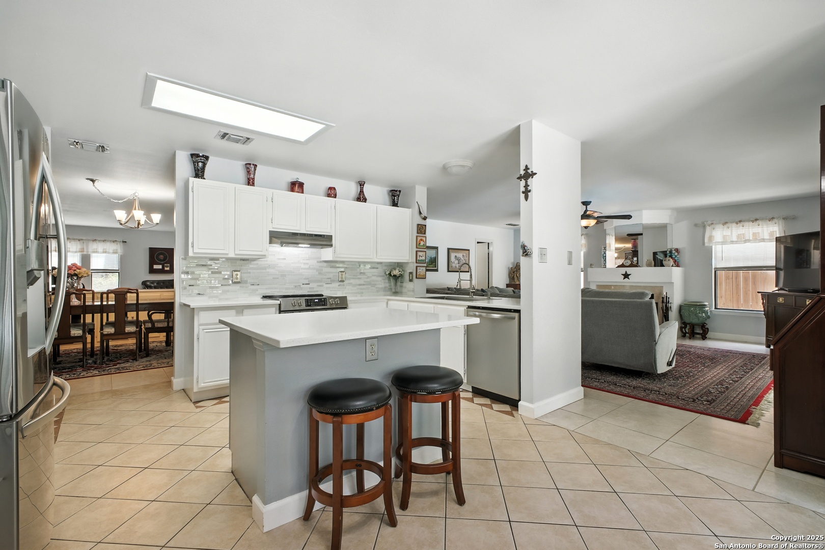 16414 Bulverde Point San Antonio, TX 78247 - Photo 15 of 46 a kitchen with a cabinets and chairs