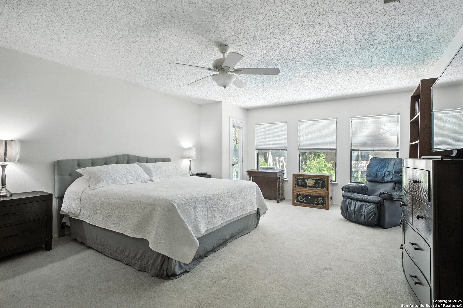 16414 Bulverde Point San Antonio, TX 78247 - Photo 23 of 46 a bedroom with bed furniture and flat tv screen
