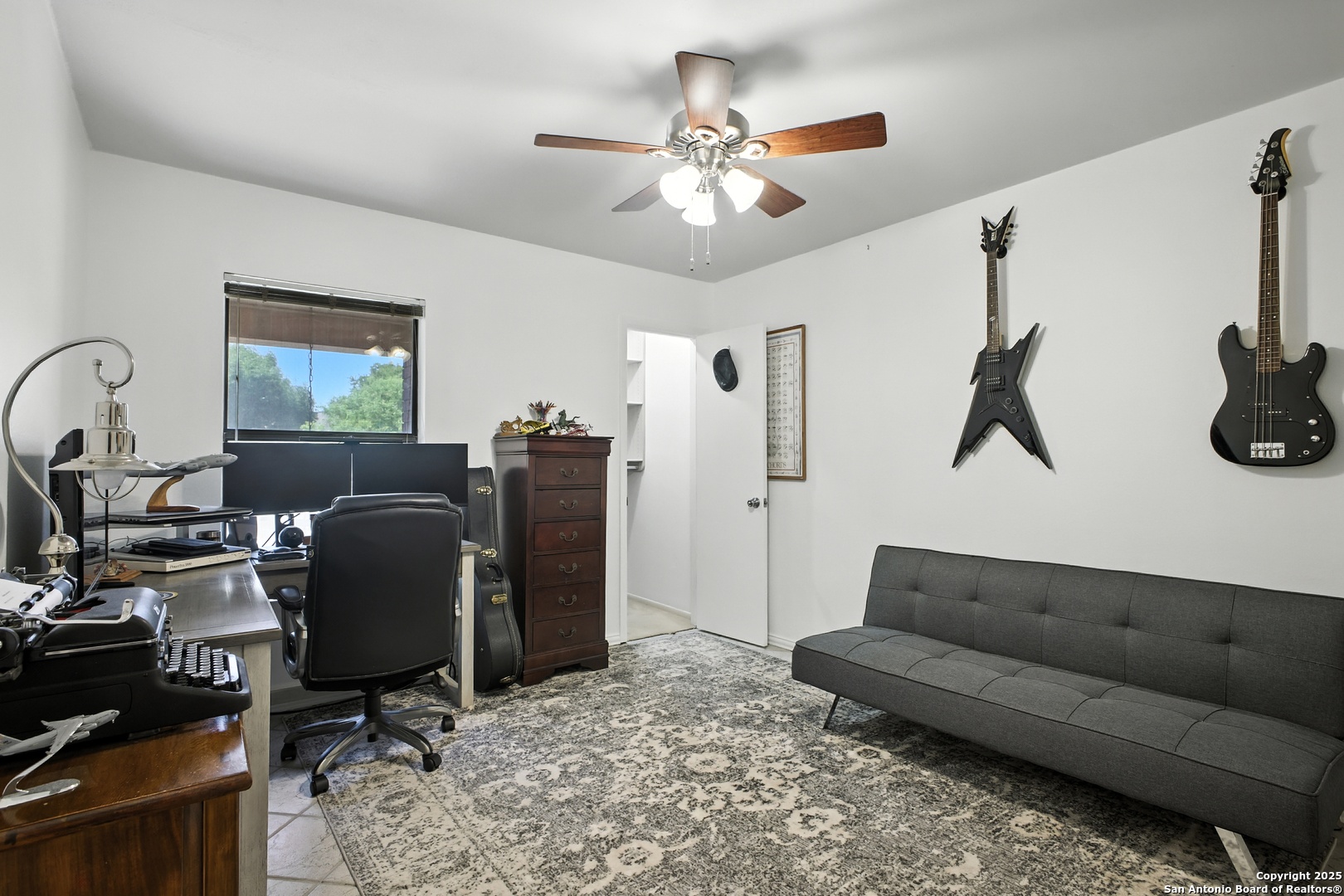 16414 Bulverde Point San Antonio, TX 78247 - Photo 31 of 46 a living room with furniture and a flat screen tv