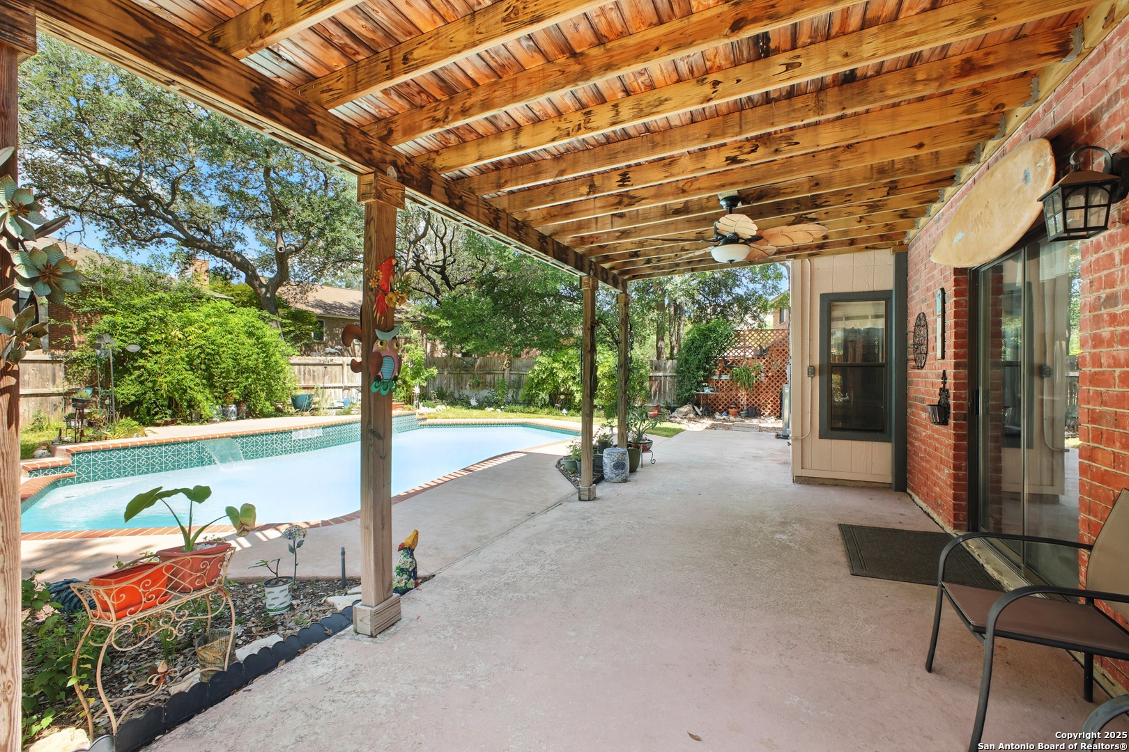 16414 Bulverde Point San Antonio, TX 78247 - Photo 38 of 46 a view of a porch with furniture and a yard