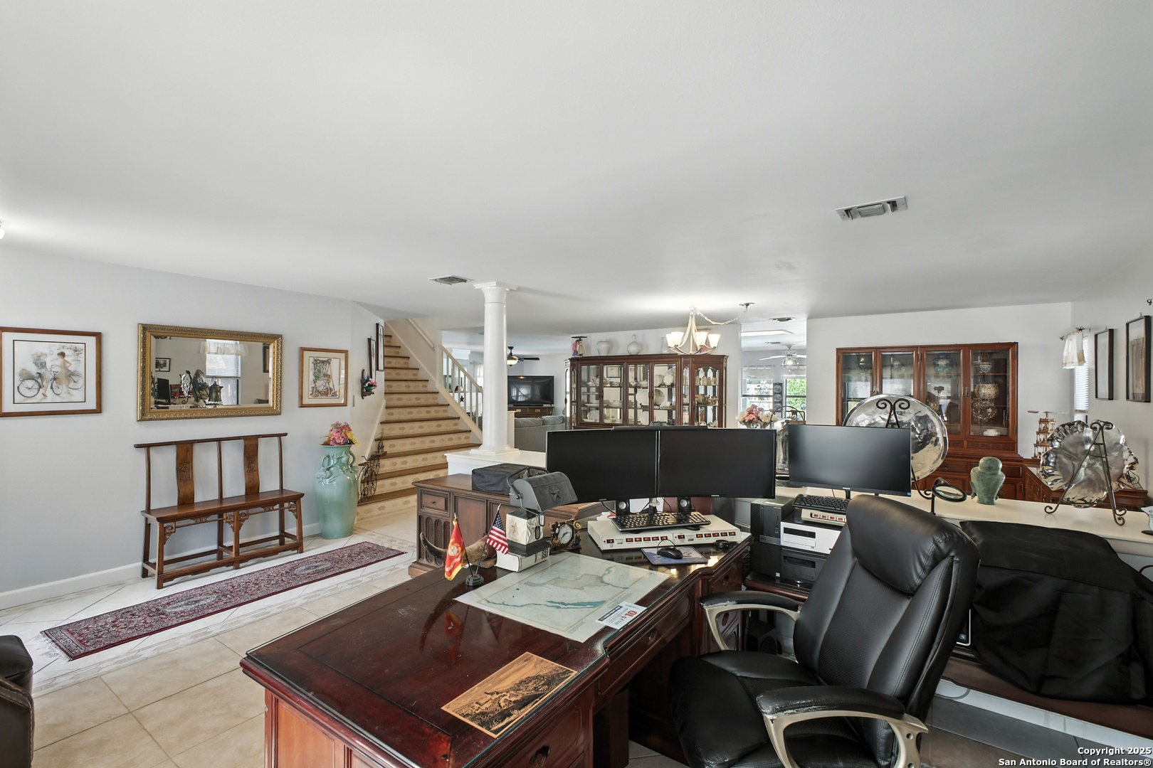 16414 Bulverde Point San Antonio, TX 78247 - Photo 4 of 46 a view of a workspace with furniture and a bookshelf