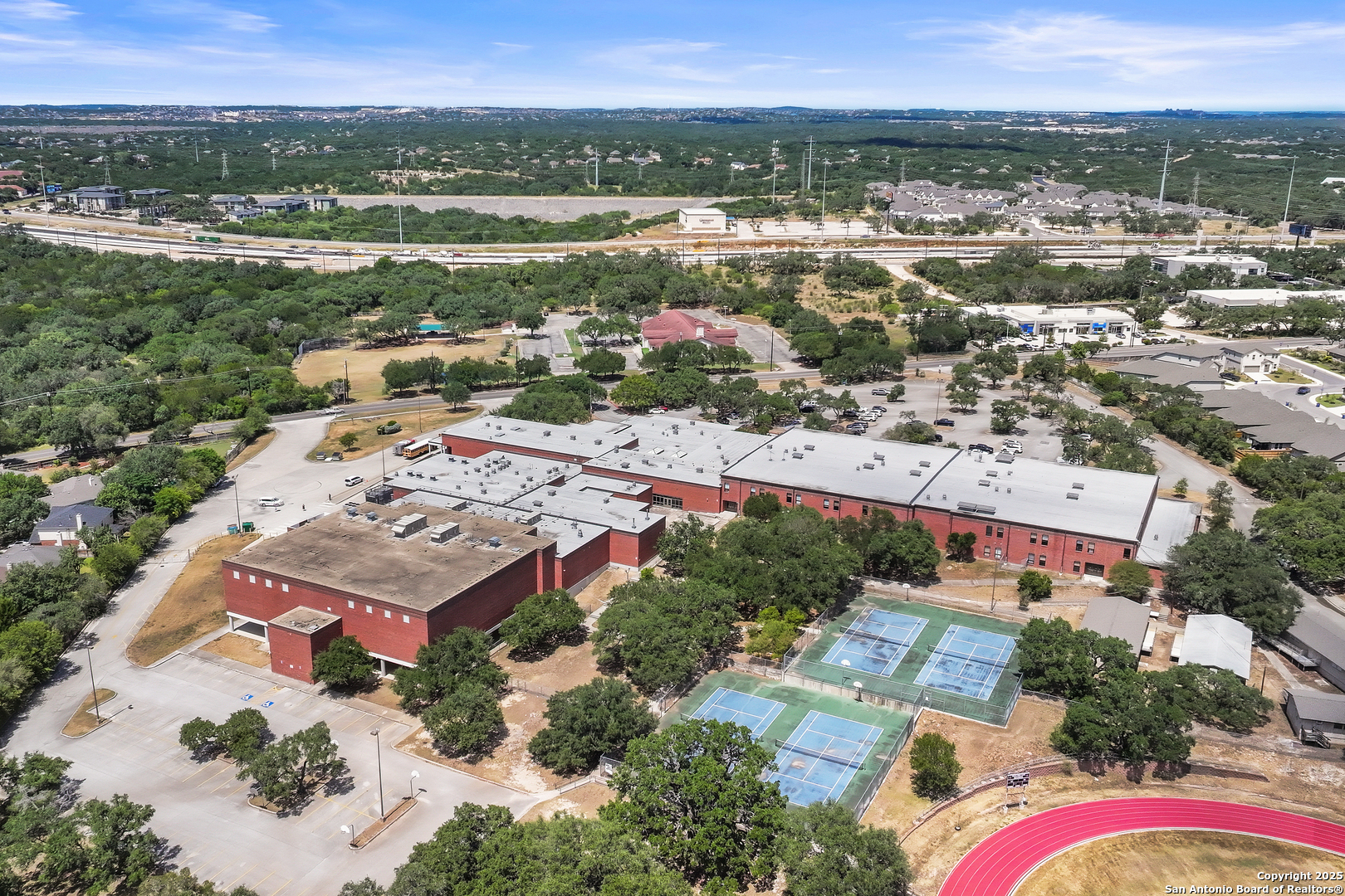 16414 Bulverde Point San Antonio, TX 78247 - Photo 46 of 46 an aerial view of residential houses with outdoor space