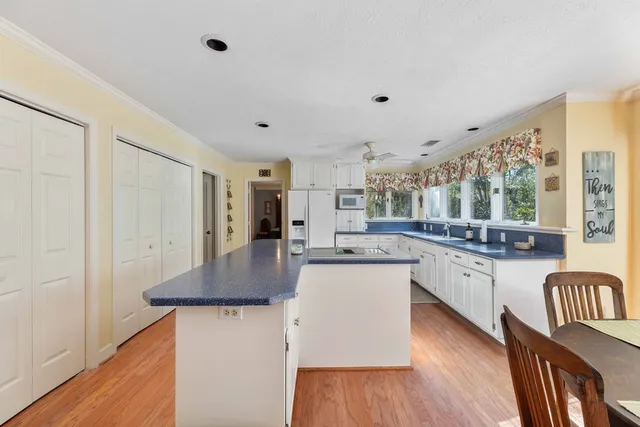 a room with furniture and a large window