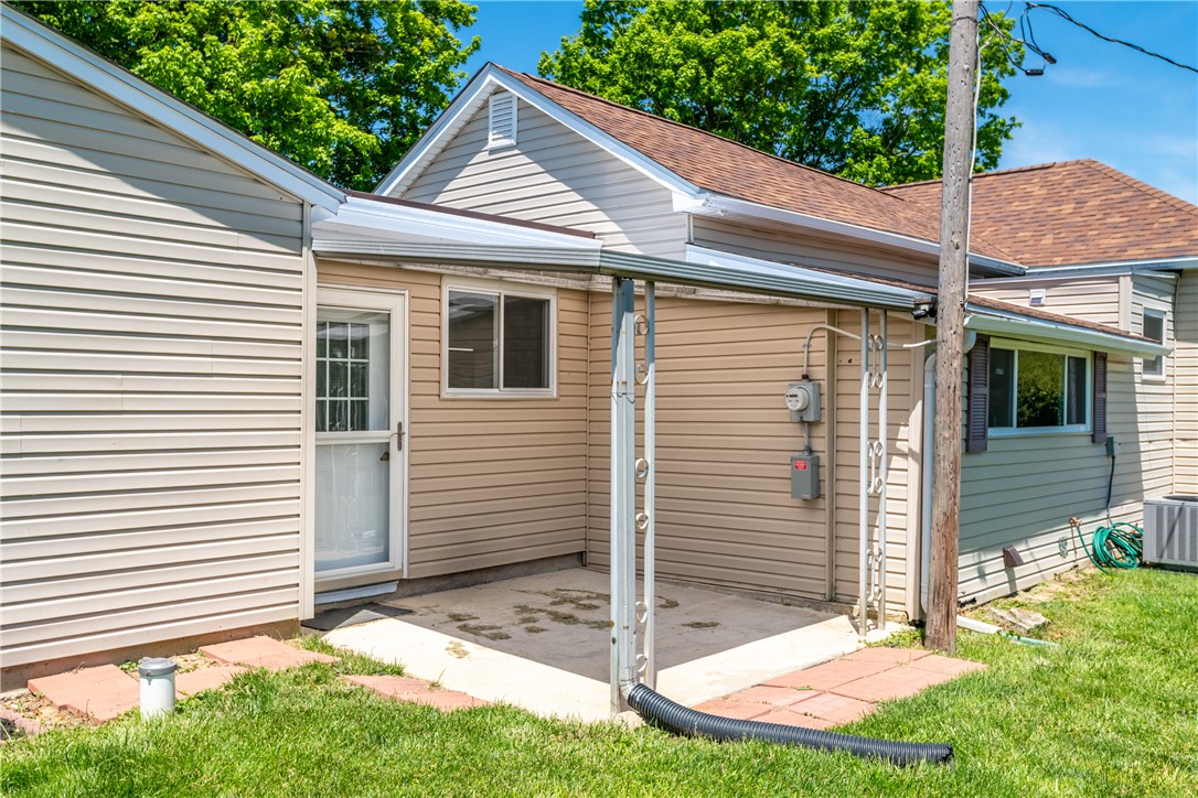 1217 Jasper Road Xenia, OH 45385 - Photo 56 of 62 This house features a covered patio perfect for outdoor relaxation.