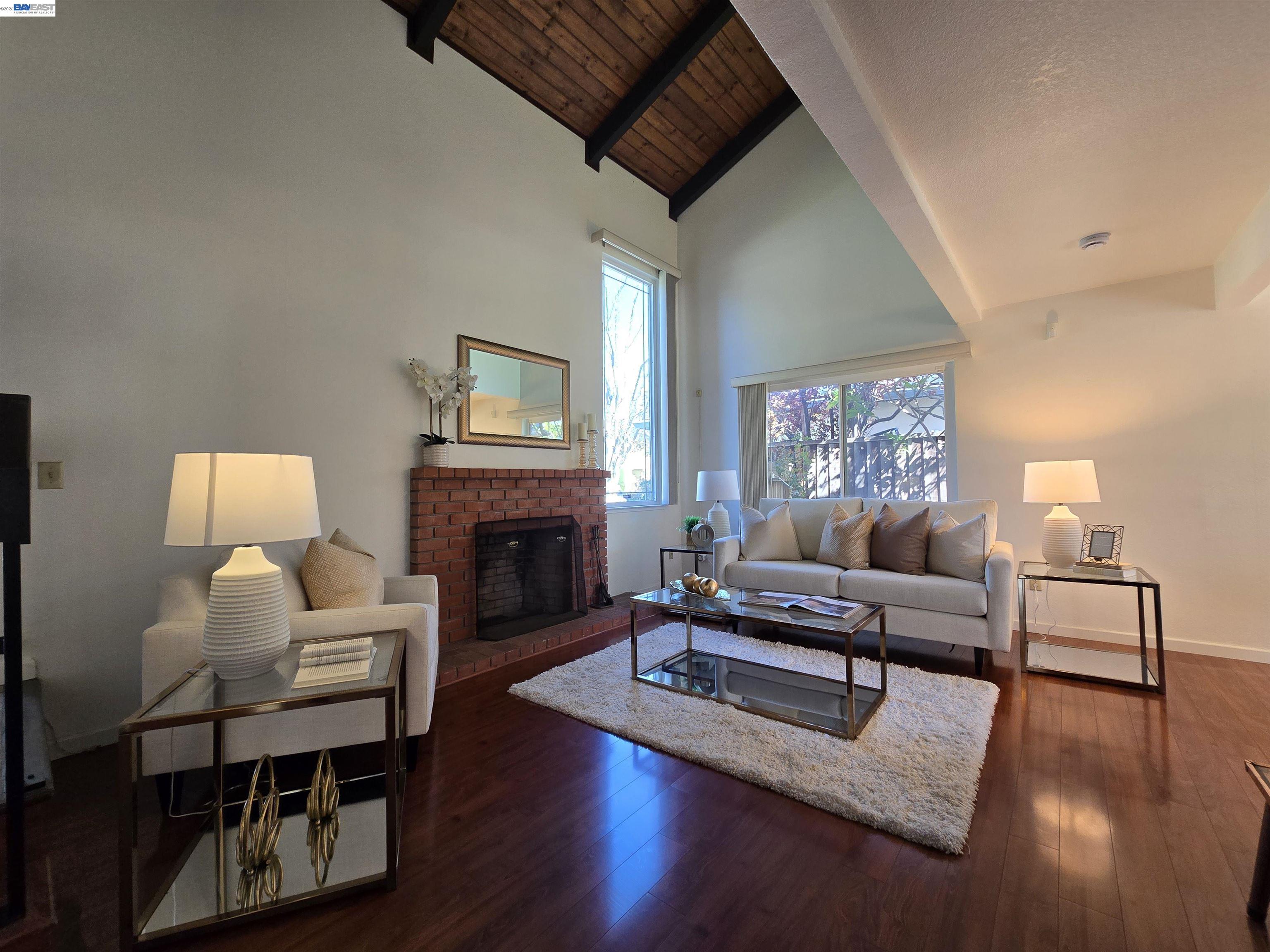 161 Hackamore Lane Fremont, CA 94539 - Photo 11 of 60 a living room with furniture and a fireplace