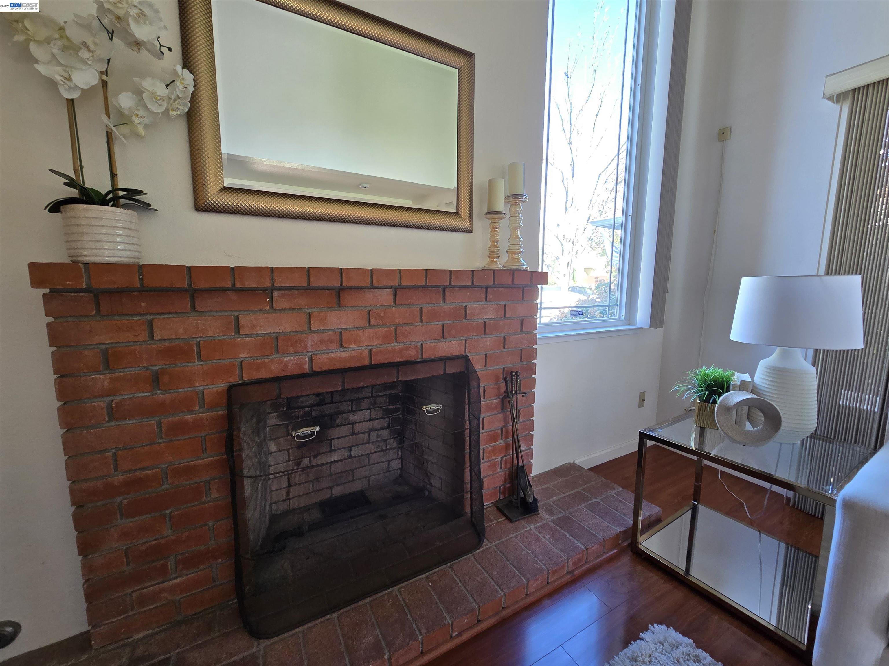 161 Hackamore Lane Fremont, CA 94539 - Photo 13 of 60 a living room with furniture and a fireplace