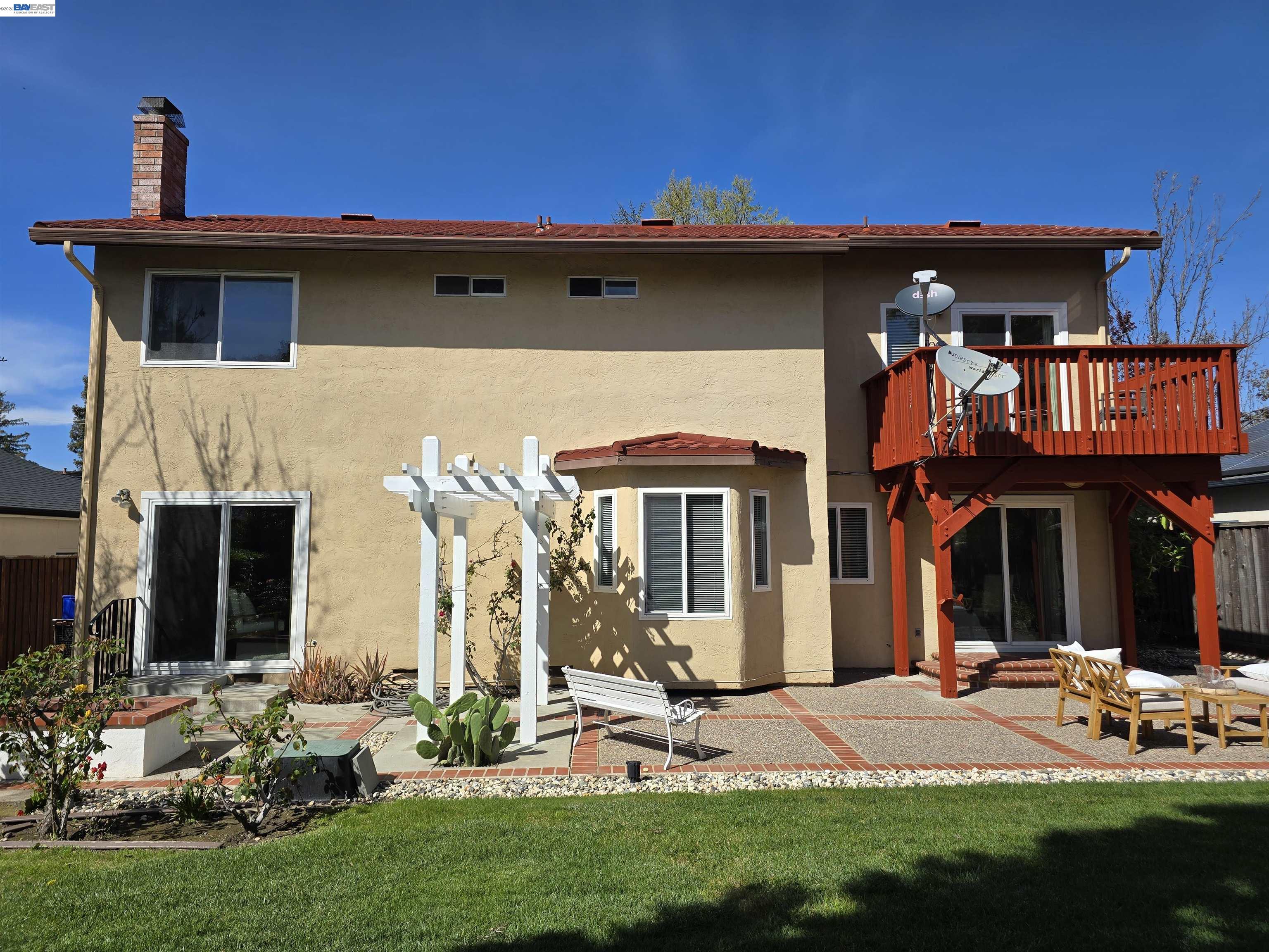 161 Hackamore Lane Fremont, CA 94539 - Photo 2 of 60 a front view of a house with garden