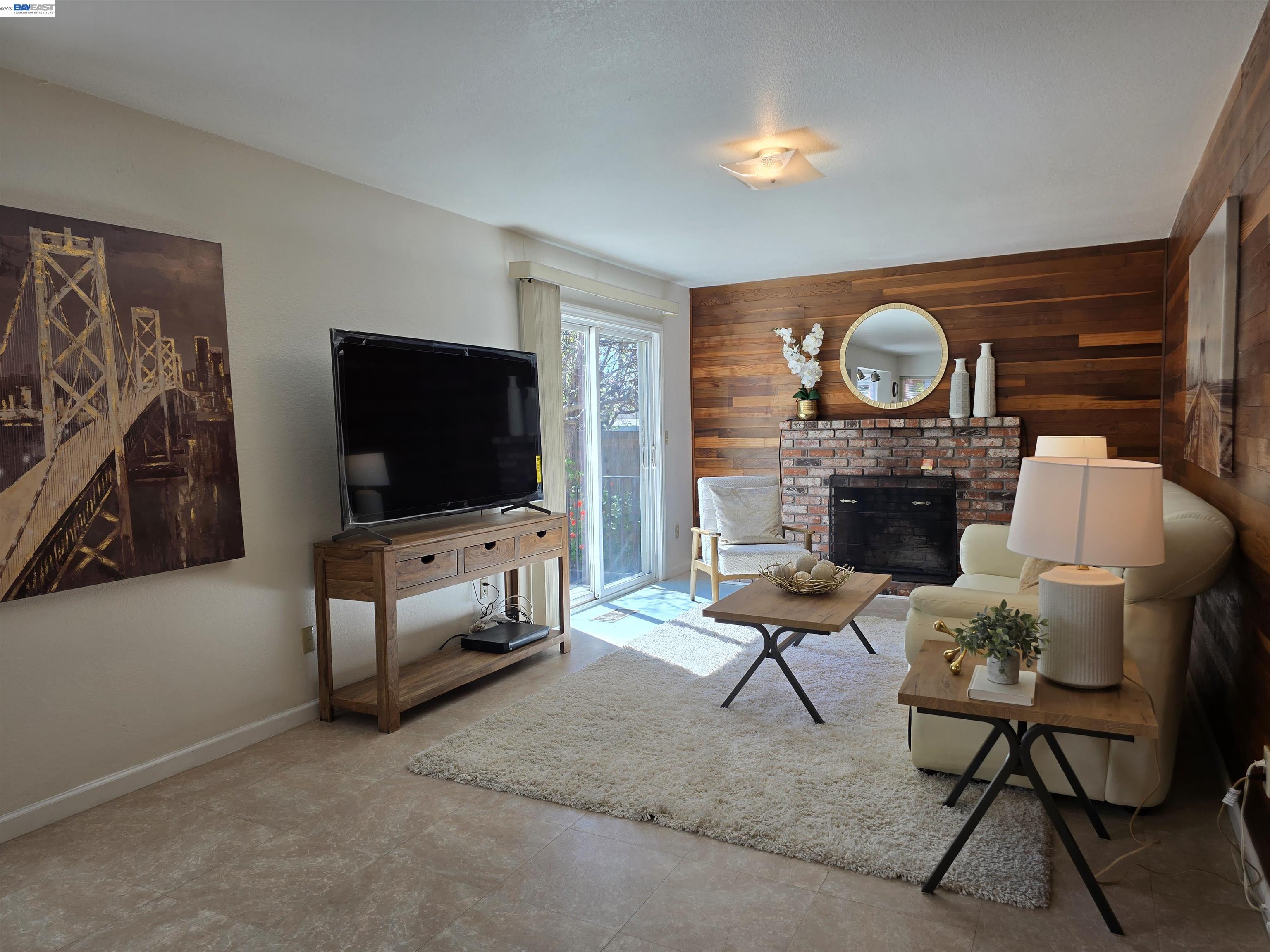 161 Hackamore Lane Fremont, CA 94539 - Photo 27 of 60 a living room with furniture and a flat screen tv