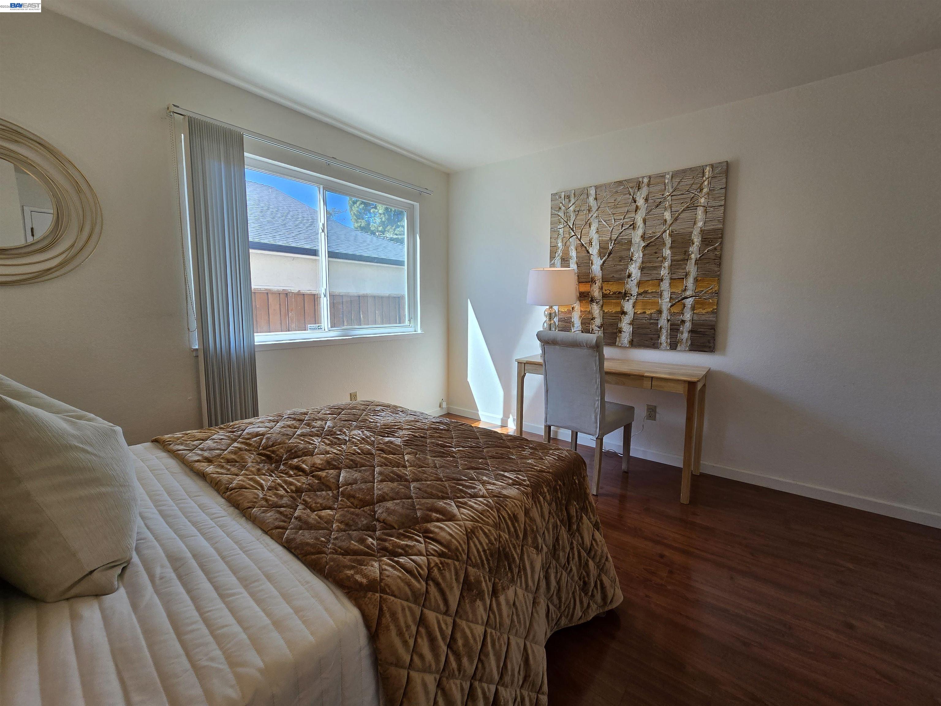 161 Hackamore Lane Fremont, CA 94539 - Photo 36 of 60 a bedroom with a bed and a window