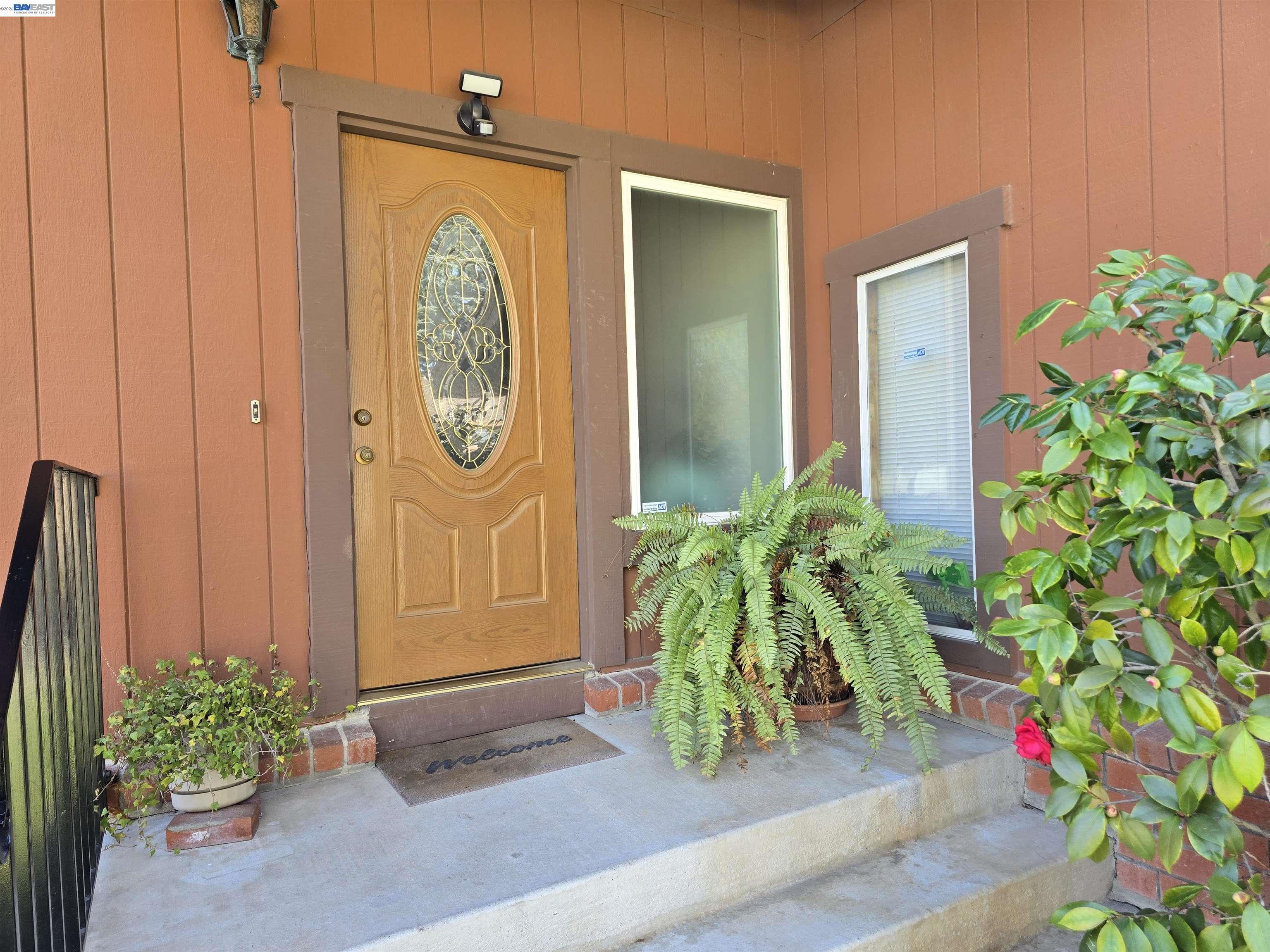 161 Hackamore Lane Fremont, CA 94539 - Photo 5 of 60 a front view of a house with entryway
